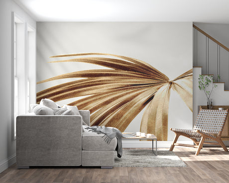 Golden palm leaf wallpaper mural creating a peaceful atmosphere in a modern living room with natural light