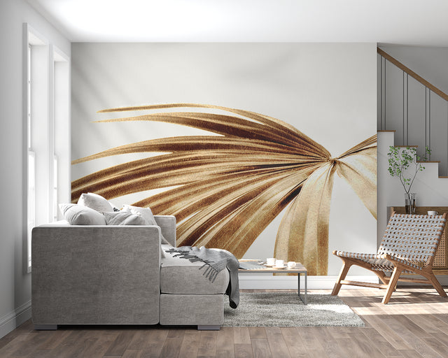 Golden palm leaf wallpaper mural creating a peaceful atmosphere in a modern living room with natural light