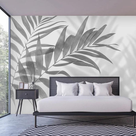 Modern Palm Leaf Mural Wallpaper creating a dramatic focal point in a minimalist living room setting