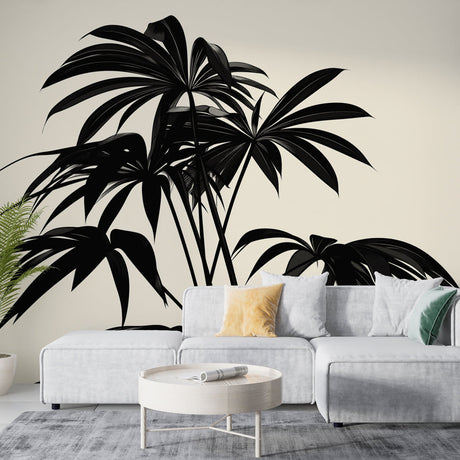 Modern living room featuring black Palm Leaves Mural Wallpaper, showing dramatic tropical silhouettes against soft beige background