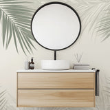 Minimalist Palm Leaves Mural Wallpaper creating a peaceful atmosphere in a modern living room with natural light