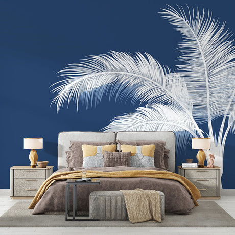 Navy blue Palm Tree Wallpaper creating a coastal vibe in modern living room with white sofa and natural light