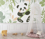 Panda wallpaper in a bright nursery with white furniture showing the calming effect of the bamboo forest design