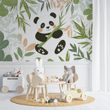 Playroom wall decorated with panda and bamboo forest wallpaper creating a fun learning environment