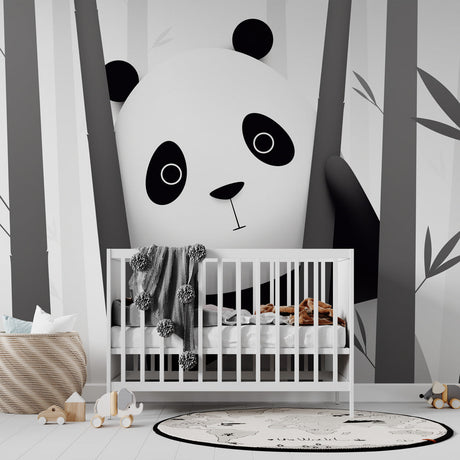 Black and white panda wallpaper creating a calm atmosphere in a modern nursery with minimalist furniture