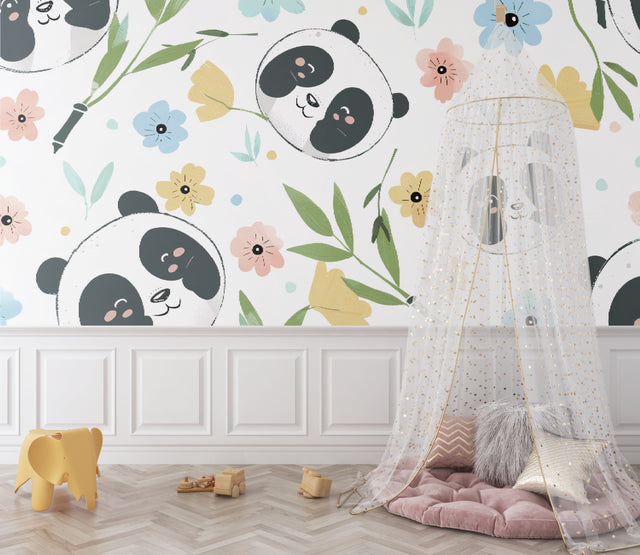 Panda nursery wallpaper in soft pastels bringing charm to a modern nursery with white furniture