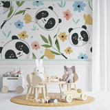 Sweet panda wall mural creating a cozy reading nook in a children's bedroom