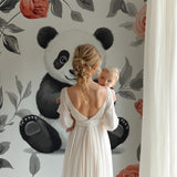 Floral panda wallpaper displayed in a modern children's reading nook