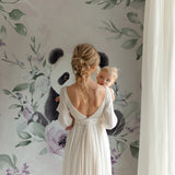 Panda nursery wallpaper transforming a playroom with its sweet watercolor design