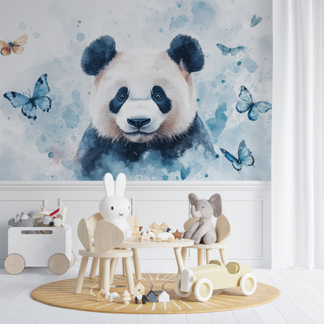 Panda wallpaper mural creating a peaceful atmosphere in a modern nursery with white furniture