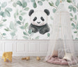Panda wallpaper mural creating a peaceful atmosphere in a modern nursery with white furniture
