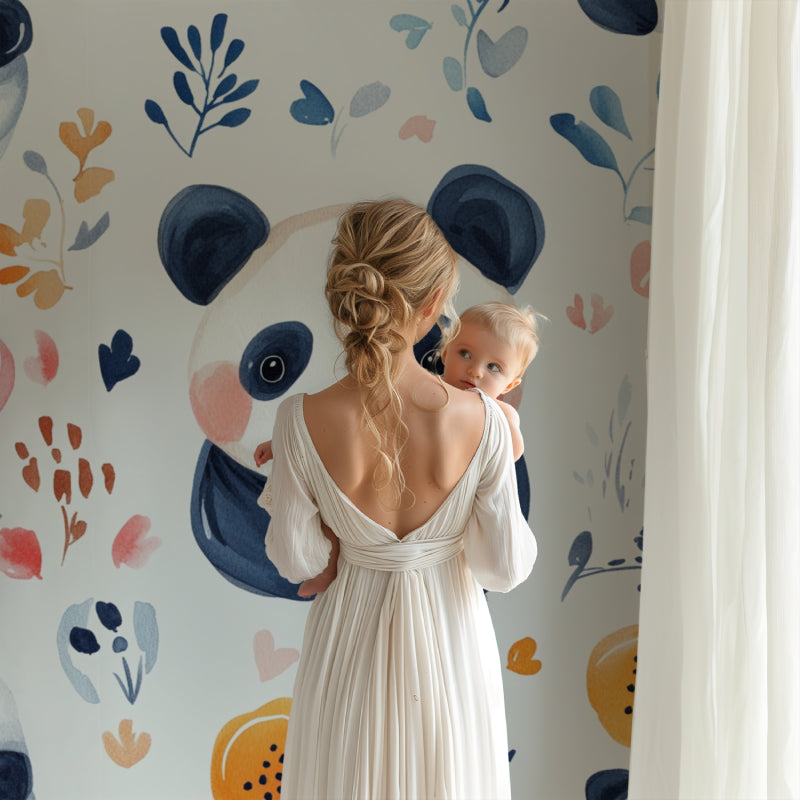 Baby room showing panda and floral wall mural with matching orange accessories