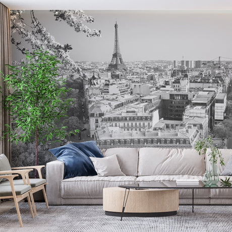 Paris cityscape wallpaper creating a stunning focal point in a modern living room with white furniture