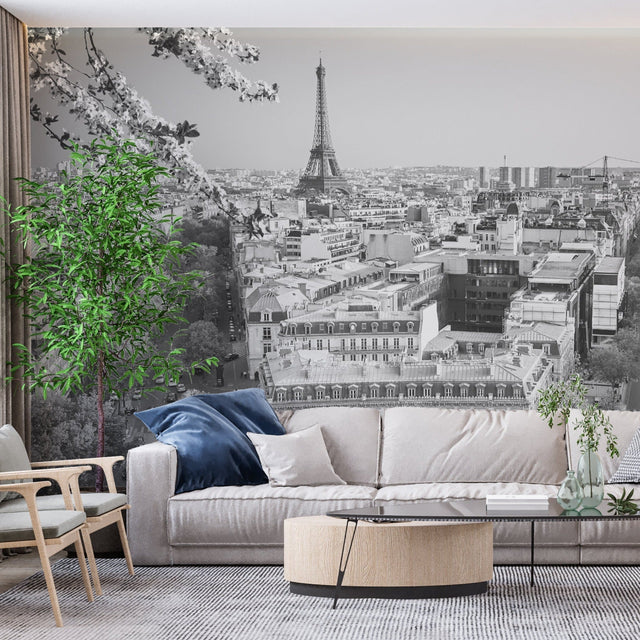 Paris cityscape wallpaper creating a stunning focal point in a modern living room with white furniture