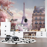 Paris themed home office with pink cherry blossom wallpaper accent wall