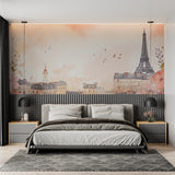 Soft pink Paris mural creating elegant backdrop in reading nook