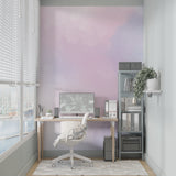 Gradient wall mural showcased in a nursery with soft furnishings