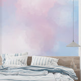 Pastel mural creating depth in a contemporary dining room setting