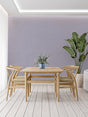 Pastel mauve wallpaper in modern living room showing soft, ambient lighting