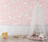 Modern pink terrazzo wallpaper adding style to a minimalist bedroom