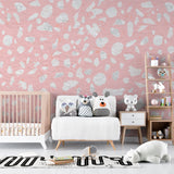 Pink terrazzo mural creating depth in a dining room setting