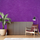 Purple geometric wallpaper making a statement in an entrance hall