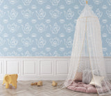Blue and white pattern mural in nursery showing gentle teapot and lotus design