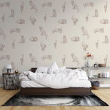Cat pattern wallpaper creating a cozy atmosphere in a modern living room, brown sketched felines adding artistic charm to white walls