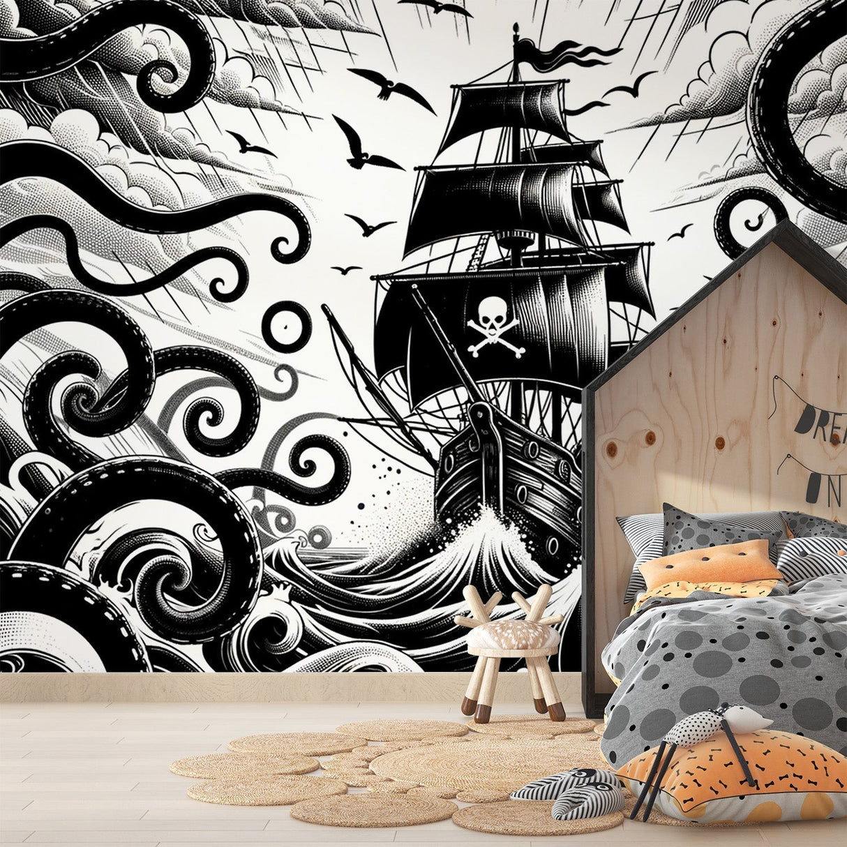 Black and white pirate ship wallpaper creating a bold statement in a modern kids bedroom with minimalist furniture
