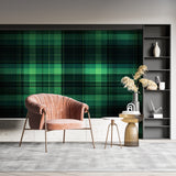 Close-up of green geometric wallpaper texture showing pattern details