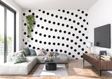 Diagonal dot pattern wallpaper adding depth to bedroom accent wall
