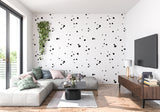 Modern dot wallpaper bringing visual interest to a contemporary bedroom