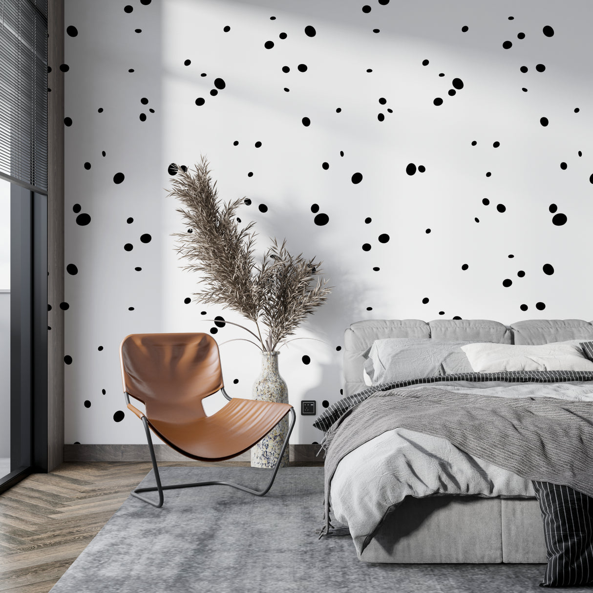 Geometric polka dot wallpaper adding depth to a Scandinavian dining room