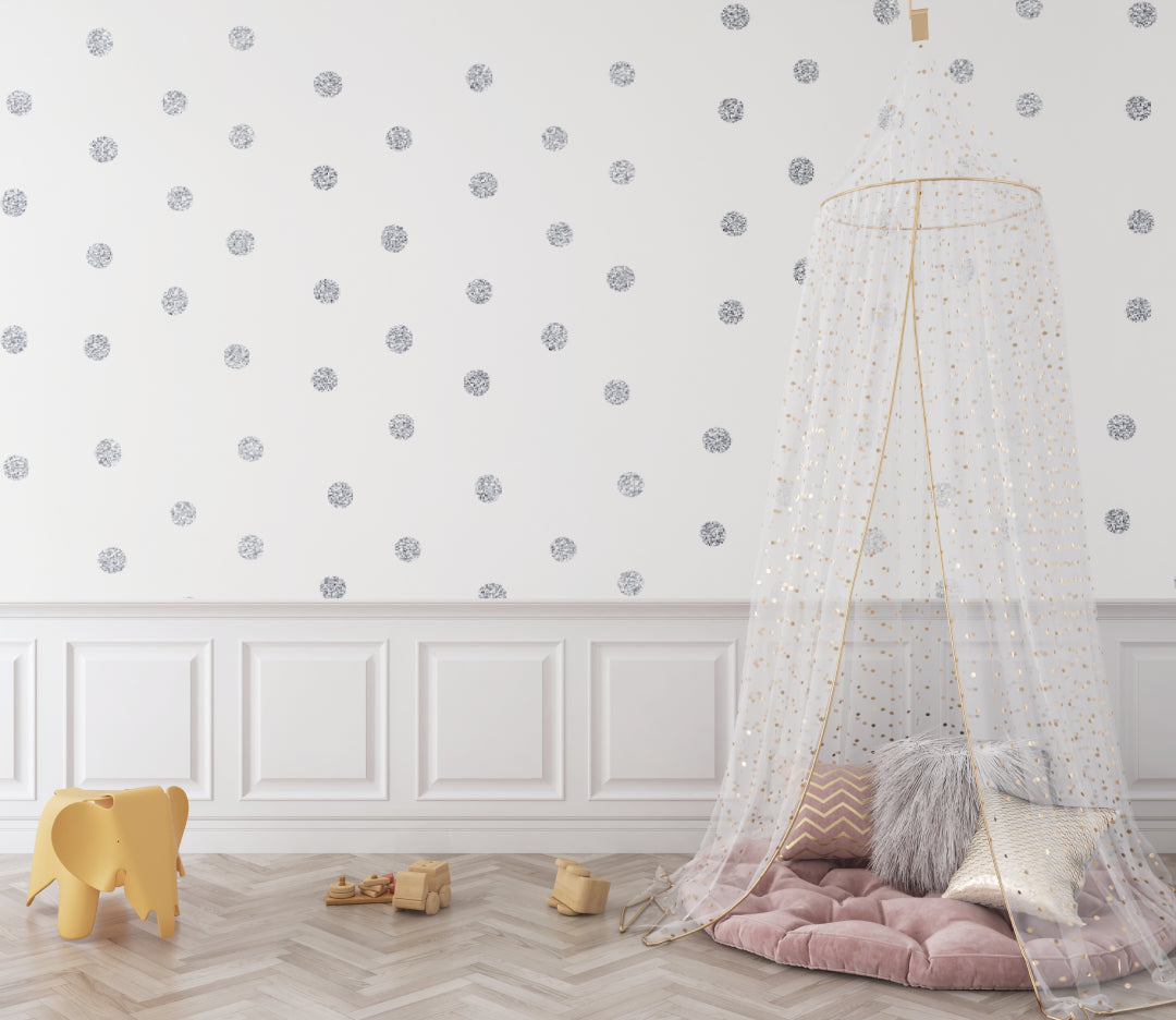 Silver dot wallpaper adding elegance to a home office space with afternoon glow