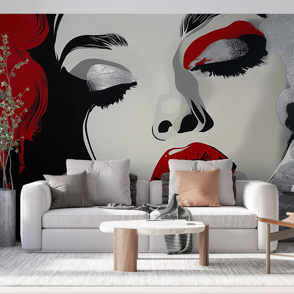 Modern Pop Art Face Wallpaper creating bold impact in a minimalist living room with black and white furniture