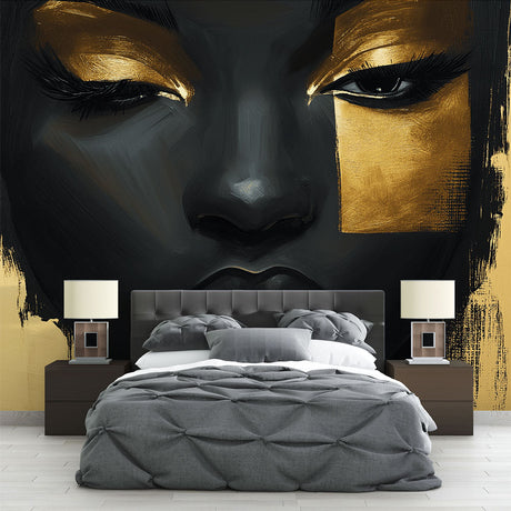 Black and gold portrait wallpaper mural creating dramatic impact in a modern living room with high ceilings and minimal furniture