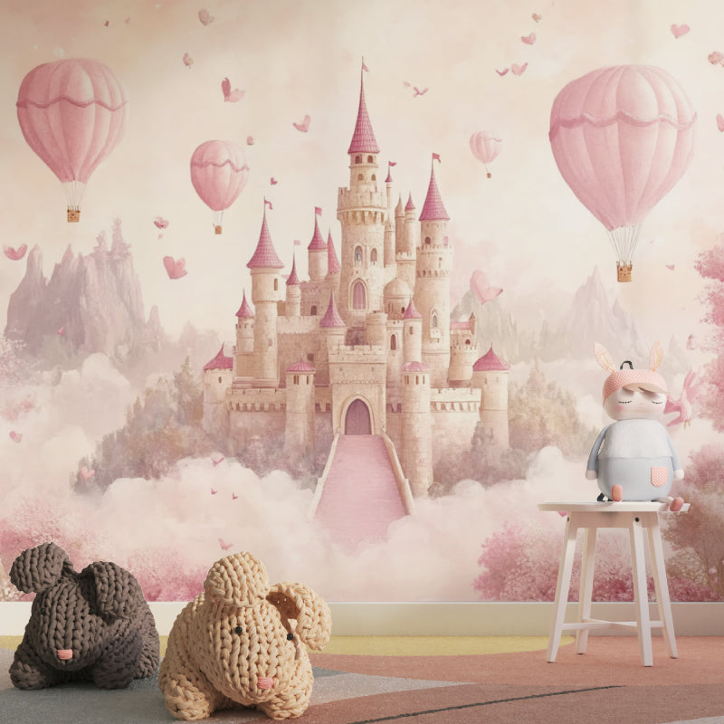 Castle wallpaper installation in a modern kids room with coordinating pink and cream decor