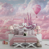 Princess castle wallpaper in a bright girl's bedroom, pink hot air balloons floating above bed
