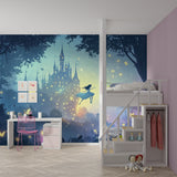 Princess castle wallpaper with dancing fairies displayed in a cozy bedroom with pink accents