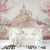 Princess castle wallpaper with pink unicorn displayed in a bright girl's bedroom, creating a magical atmosphere