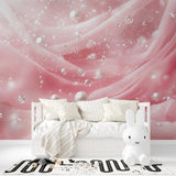 Princess themed pink wallpaper with pearl details in a nursery setting