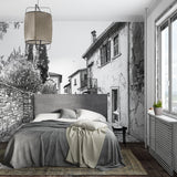 Black and white Provence mural bringing character to a cozy living room setting