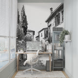 Mediterranean street scene wallpaper transforming a home office with French charm
