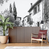 French village art mural making a bedroom feel like a boutique hotel in Provence