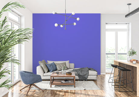 Modern purple wallpaper mural creating a bold statement wall in a minimalist living room with white furniture