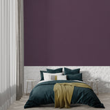Purple mural wallpaper in entryway showcasing seamless installation and rich color