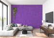 Purple glitter wallpaper creating a magical atmosphere in a modern living room with natural light highlighting the shimmer effect