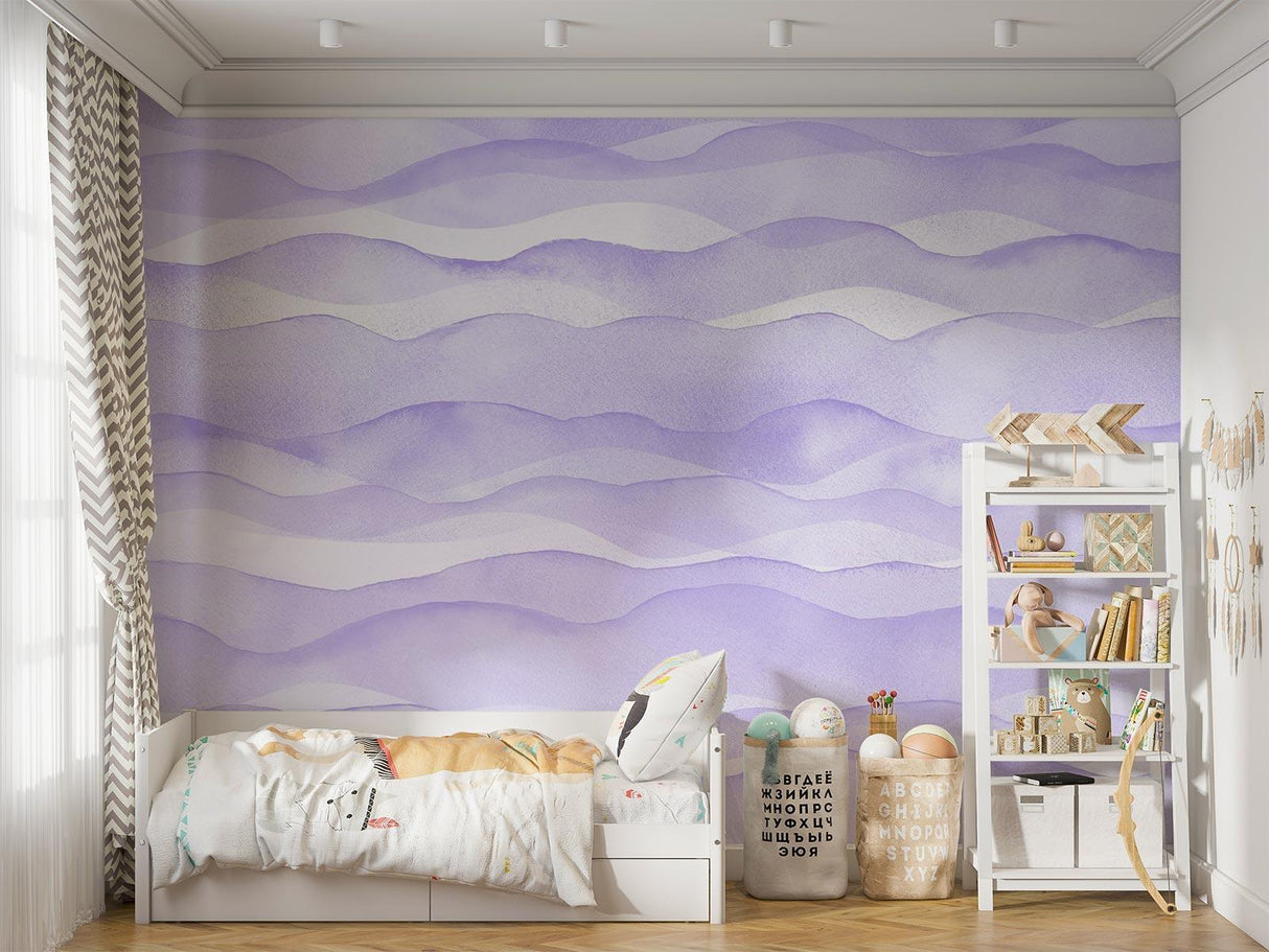 Watercolor wave mural adding movement to a child's playroom, purple tones complementing natural light