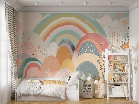 Rainbow nursery wallpaper creating a soft, dreamy atmosphere in a modern white nursery with natural wood furniture