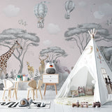 Safari nursery wallpaper with hot air balloons displayed in a bright, modern nursery with white furniture